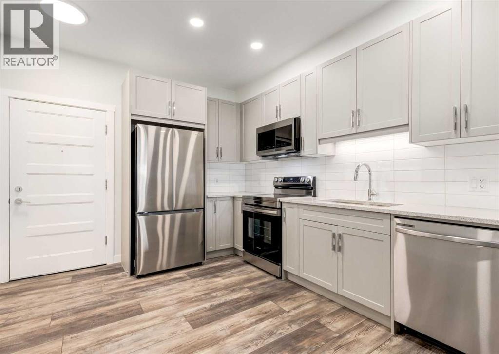 408, 125 Wolf Hollow Crescent Se, Calgary, Alberta  T2X 5W9 - Photo 4 - A2325795