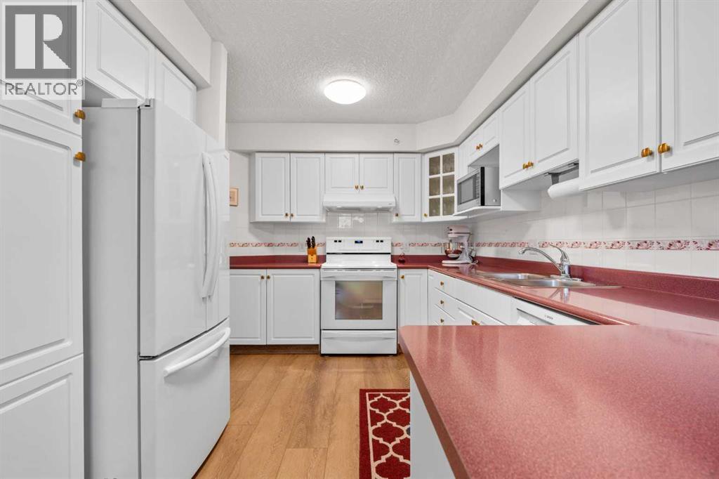 413, 7239 Sierra Morena Boulevard Sw, Calgary, Alberta  T3H 3L7 - Photo 6 - A2325258