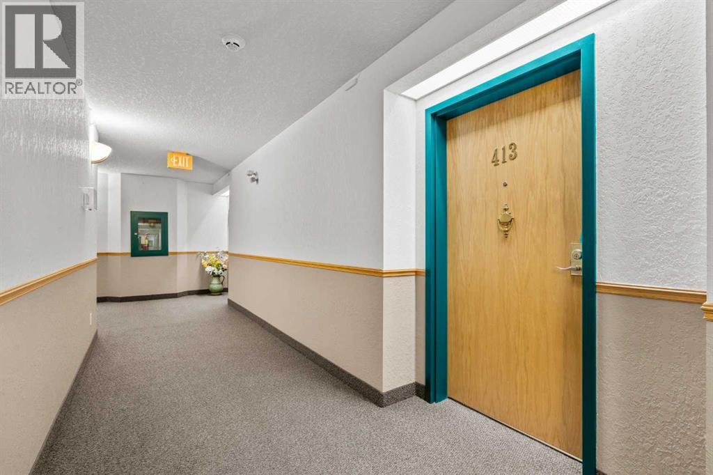 413, 7239 Sierra Morena Boulevard Sw, Calgary, Alberta  T3H 3L7 - Photo 2 - A2325258