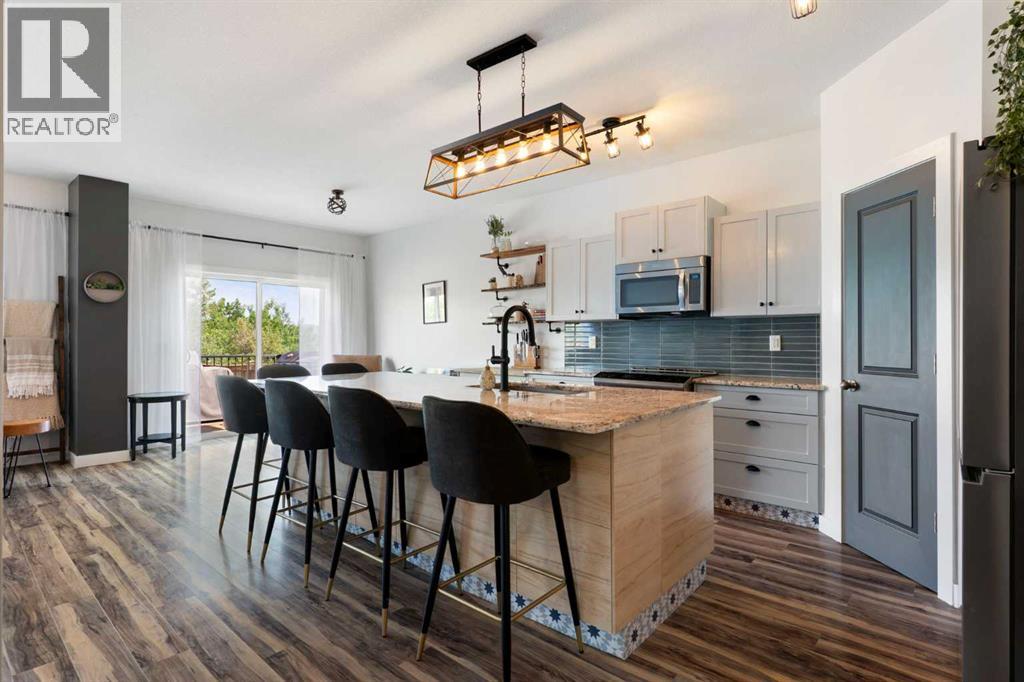 174 Fireside Place, Cochrane, Alberta  T4C 0R6 - Photo 4 - A2325166