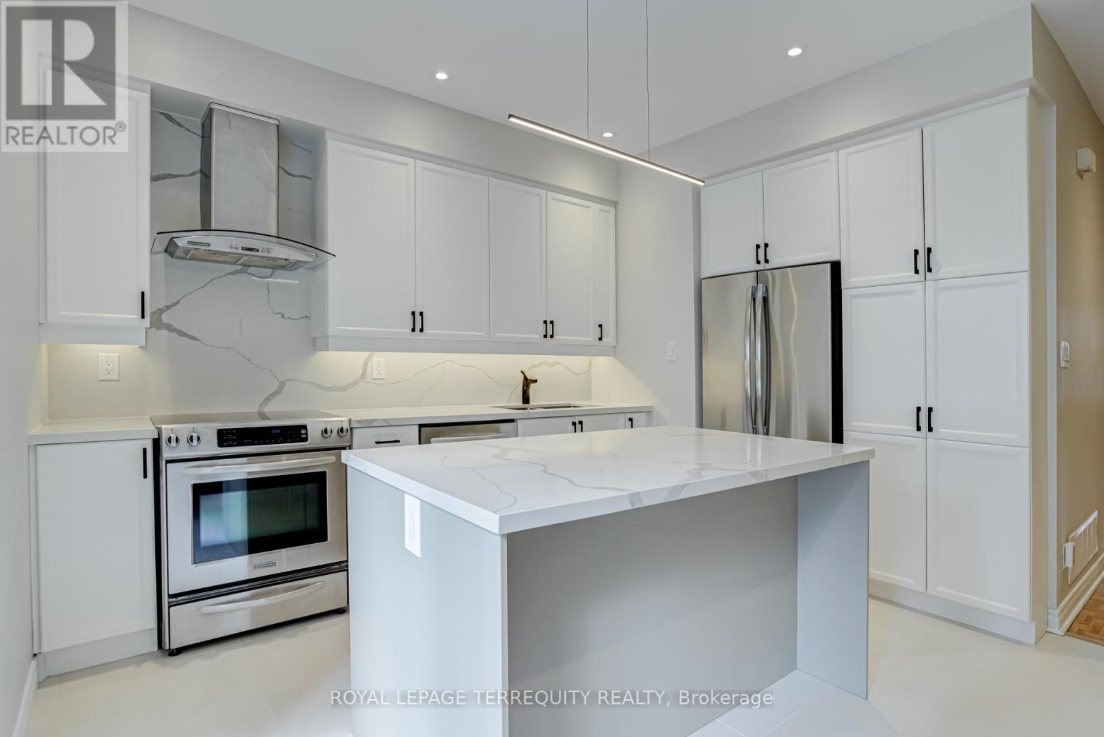 Bright, Spacious & Modern Townhouse Nestled In The Heart Of Downtown! Perfect Setting For Family Gatherings & Entertainment ... Expansive Open Concept Lr/Dr W/Gas Fireplace & 10 Ft Ceilings; Modern Renovated Eat-In Kitchen Featuring Centre Island & Breakfast Bar, Quartz Counters & Book-Matched Backsplash, Custom Coffee Bar, High-End S/S Appliances, Double S/S Sink W/Pull-Down Faucet, Ample Storage & Walk-Out To Private Stone-Paved Outdoor Seating Oasis Meant For Entertaining! Oversized 2nd Fl Bedrooms & Beautifully Renovated Bathrooms (2023). Relax In 3rd Floor Primary Bedroom W/Ensuite Bath, Large Closet & Private Outdoor Terrace. Family-Sized Recreation Room W/High Ceilings, Pot Lights & Bamboo Flooring Will House All Your Parties, Hobbies & Games. Laundry Room On 2nd Floor, Potlights W/Dimmers Thru-Out. Freshly Renovated & Painted In Neutral Colours. Laneway Garage Access With Walk-Thru Backyard Patio To Kitchen. Walk-Transit-Bike Score 96-100-99. Meticulous & Move-In Ready.Bright, Spacious & Modern Townhouse Nestled In The Heart Of Downtown! Perfect Setting For Family Gatherings & Entertainment ... Expansive Open Concept Lr/Dr W/Gas Fireplace & 10 Ft Ceilings; Modern Renovated Eat-In Kitchen Featuring Centre Island & Breakfast Bar, Quartz Counters & Book-Matched Backsplash, Custom Coffee Bar, High-End S/S Appliances, Double S/S Sink W/Pull-Down Faucet, Ample Storage & Walk-Out To Private Stone-Paved Outdoor Seating Oasis Meant For Entertaining! Oversized 2nd Fl Bedrooms & Beautifully Renovated Bathrooms (2023). Relax In 3rd Floor Primary Bedroom W/Ensuite Bath, Large Closet & Private Outdoor Terrace. Family-Sized Recreation Room W/High Ceilings, Pot Lights & Bamboo Flooring Will House All Your Parties, Hobbies & Games. Laundry Room On 2nd Floor, Potlights W/Dimmers Thru-Out. Freshly Renovated & Painted In Neutral Colours. Laneway Garage Access With Walk-Thru Backyard Patio To Kitchen. Walk-Transit-Bike Score 96-100-99. Meticulous & Move-In Ready. (id:48254)