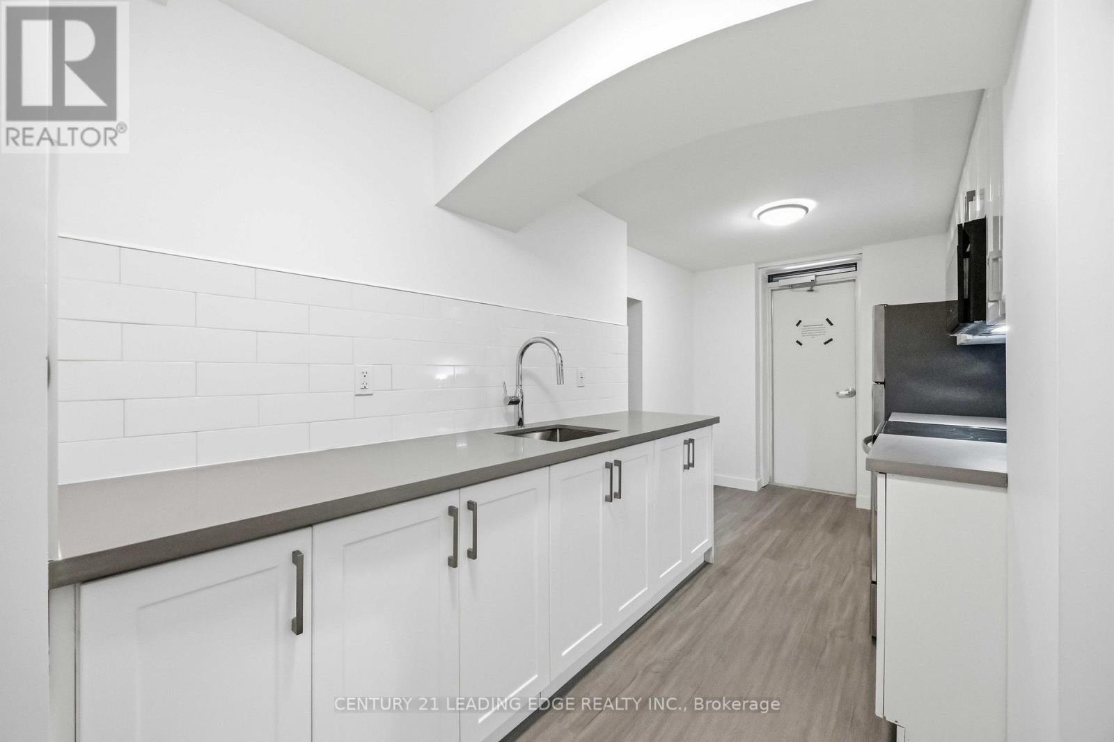 Lower - 1a Leonard Avenue, Toronto, Ontario M5T 2P8 - Photo 7 - C12854084