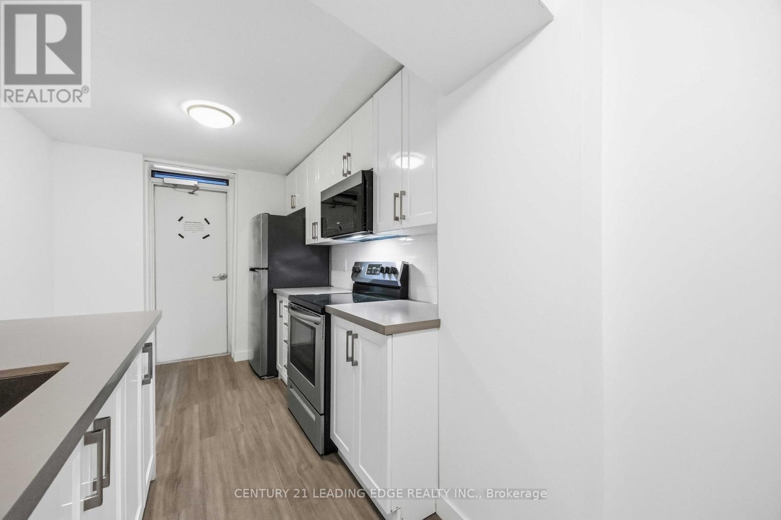 Lower - 1a Leonard Avenue, Toronto, Ontario M5T 2P8 - Photo 9 - C12854084