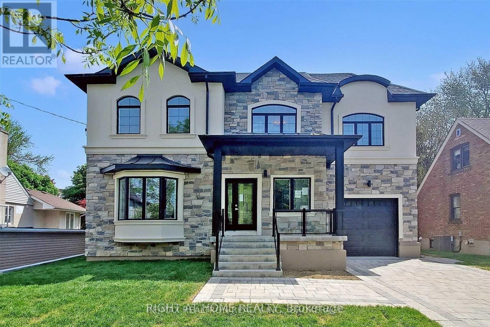 <div class="slider-price">$2,199,900</div><p>67 Scarborough Heights Boulevard, Toronto, Ontario</p>
