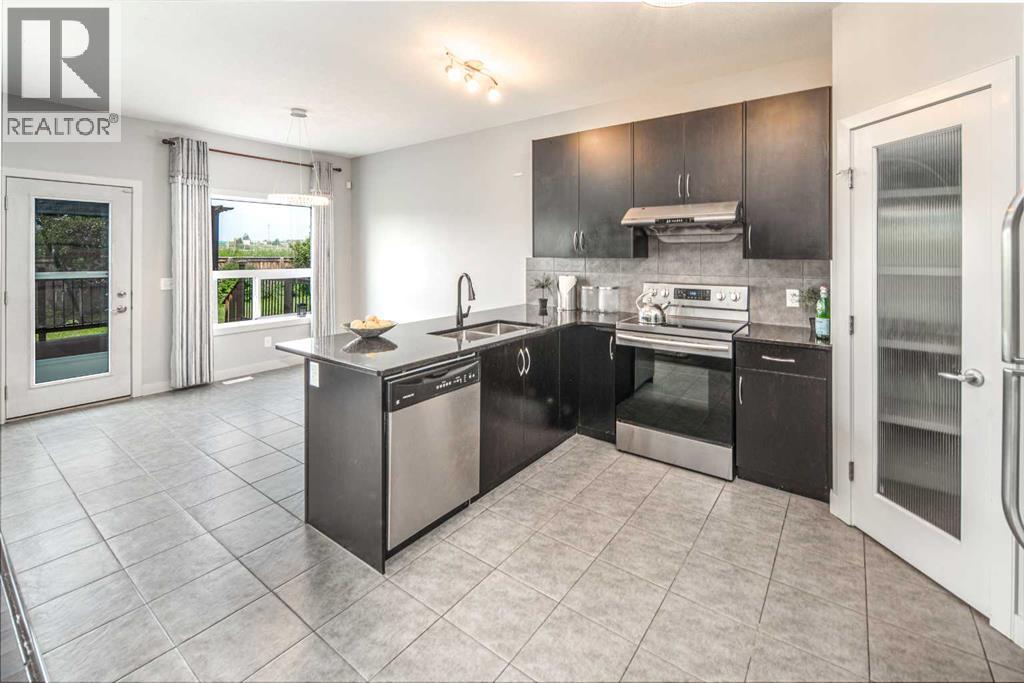 127 Everwoods Park SW, Calgary, Alberta  T2Y 0G3 - Photo 12 - A2325625