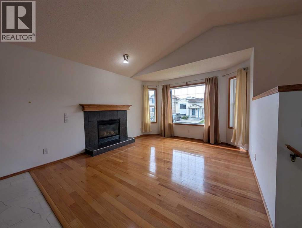 151 Taracove Estate Drive Ne, Calgary, Alberta  T3J 4R1 - Photo 4 - A2325112