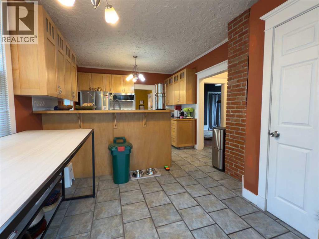 1126 19 Avenue NW, Calgary, Alberta  T2M 1A1 - Photo 17 - A2325751