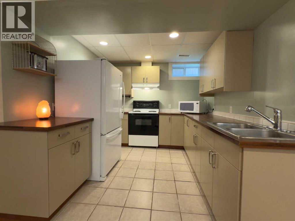 1126 19 Avenue NW, Calgary, Alberta  T2M 1A1 - Photo 33 - A2325751