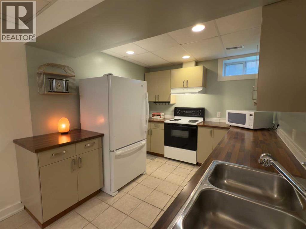 1126 19 Avenue NW, Calgary, Alberta  T2M 1A1 - Photo 34 - A2325751