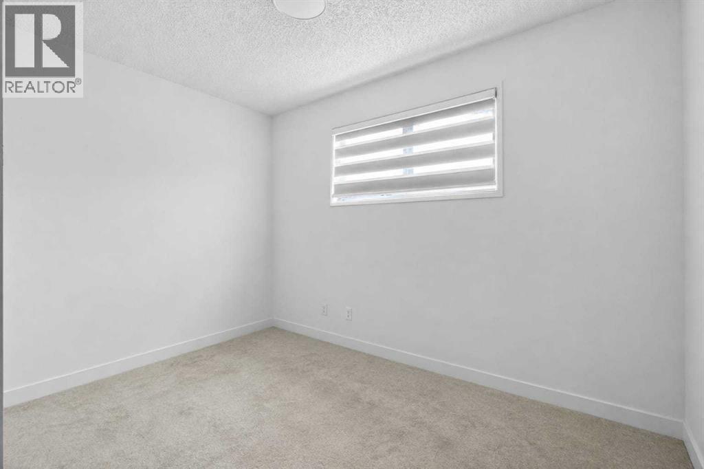 128 Castledale Crescent NE, Calgary, Alberta  T3J 1X4 - Photo 13 - A2311079
