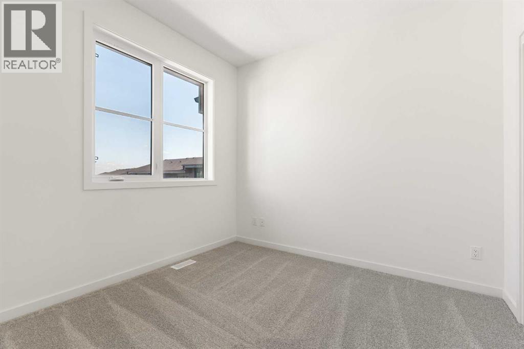 90, 1453 Na'a Drive SW, Calgary, Alberta  T3H 6H7 - Photo 23 - A2325506