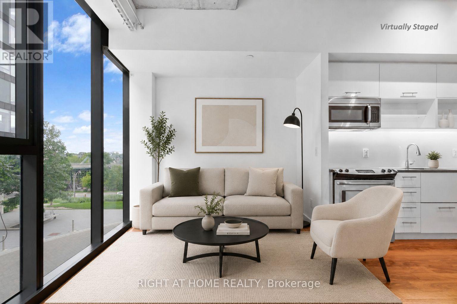 306 - 32 TROLLEY CRESCENT, Toronto, Ontario