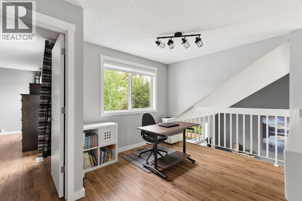 692 Woodpark Boulevard SW, Calgary, Alberta  T2W 3R7 - Photo 23 - A2325814