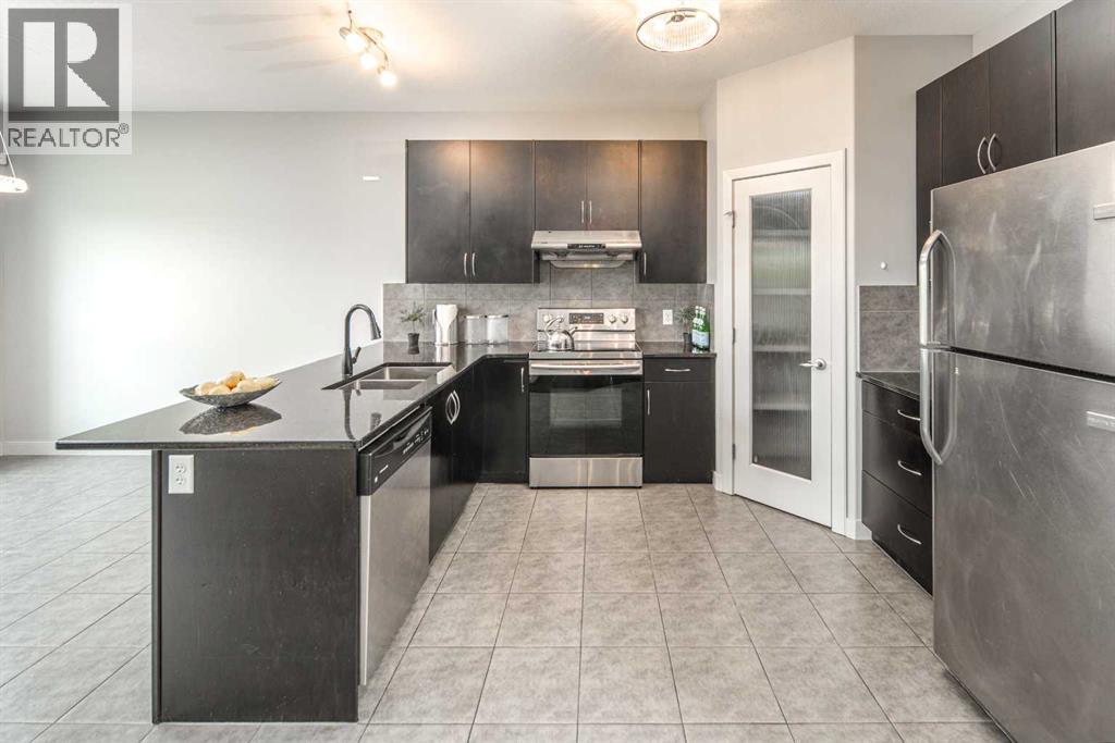 127 Everwoods Park SW, Calgary, Alberta  T2Y 0G3 - Photo 9 - A2325625