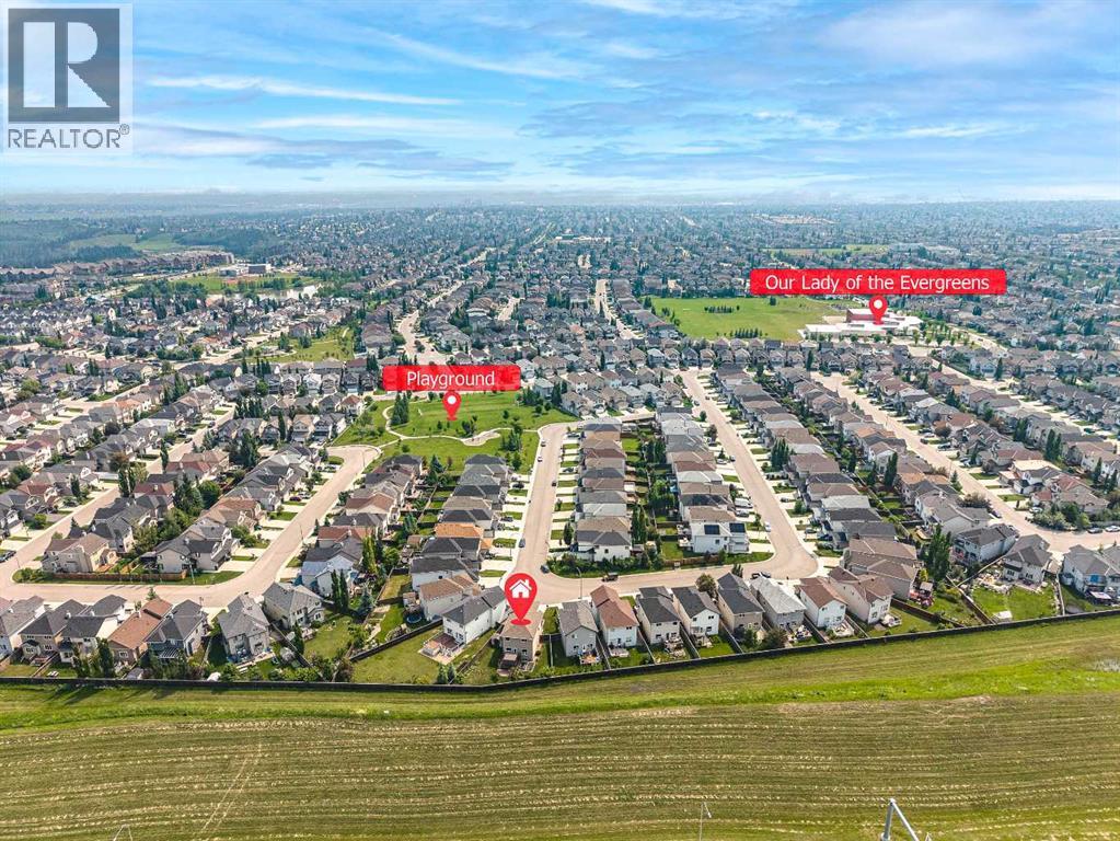 127 Everwoods Park SW, Calgary, Alberta  T2Y 0G3 - Photo 2 - A2325625