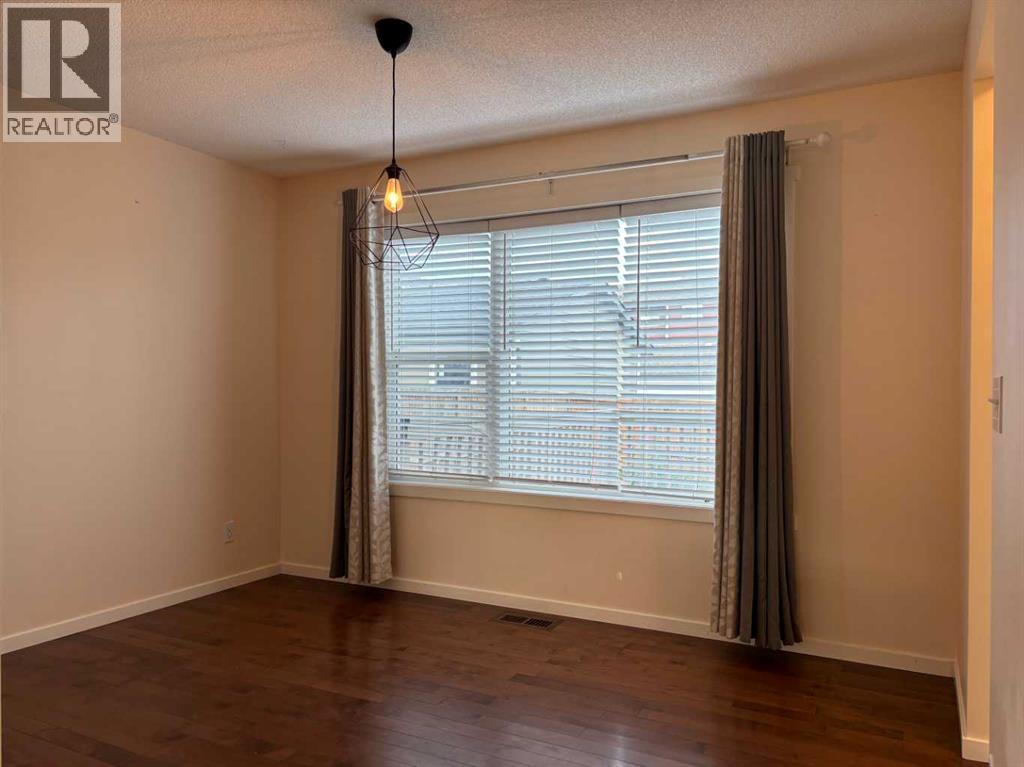159 Panamount Way NW, Calgary, Alberta  T3K 0P7 - Photo 6 - A2311235