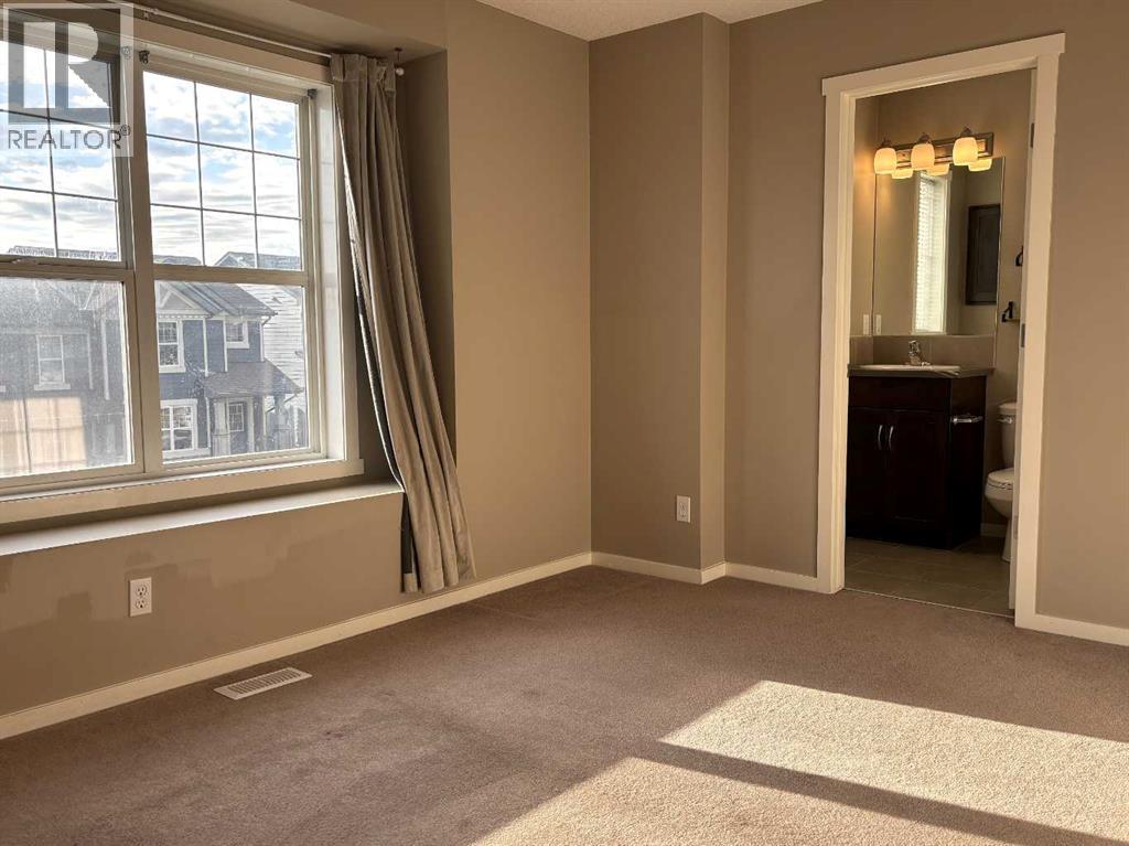 159 Panamount Way NW, Calgary, Alberta  T3K 0P7 - Photo 11 - A2311235
