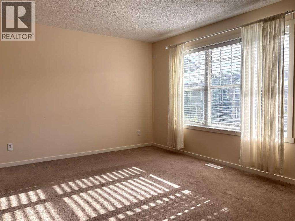 159 Panamount Way NW, Calgary, Alberta  T3K 0P7 - Photo 5 - A2311235