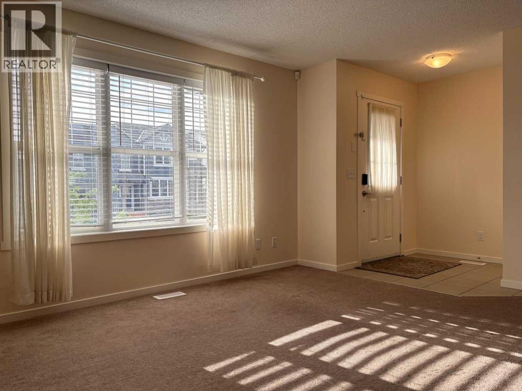 159 Panamount Way NW, Calgary, Alberta  T3K 0P7 - Photo 4 - A2311235