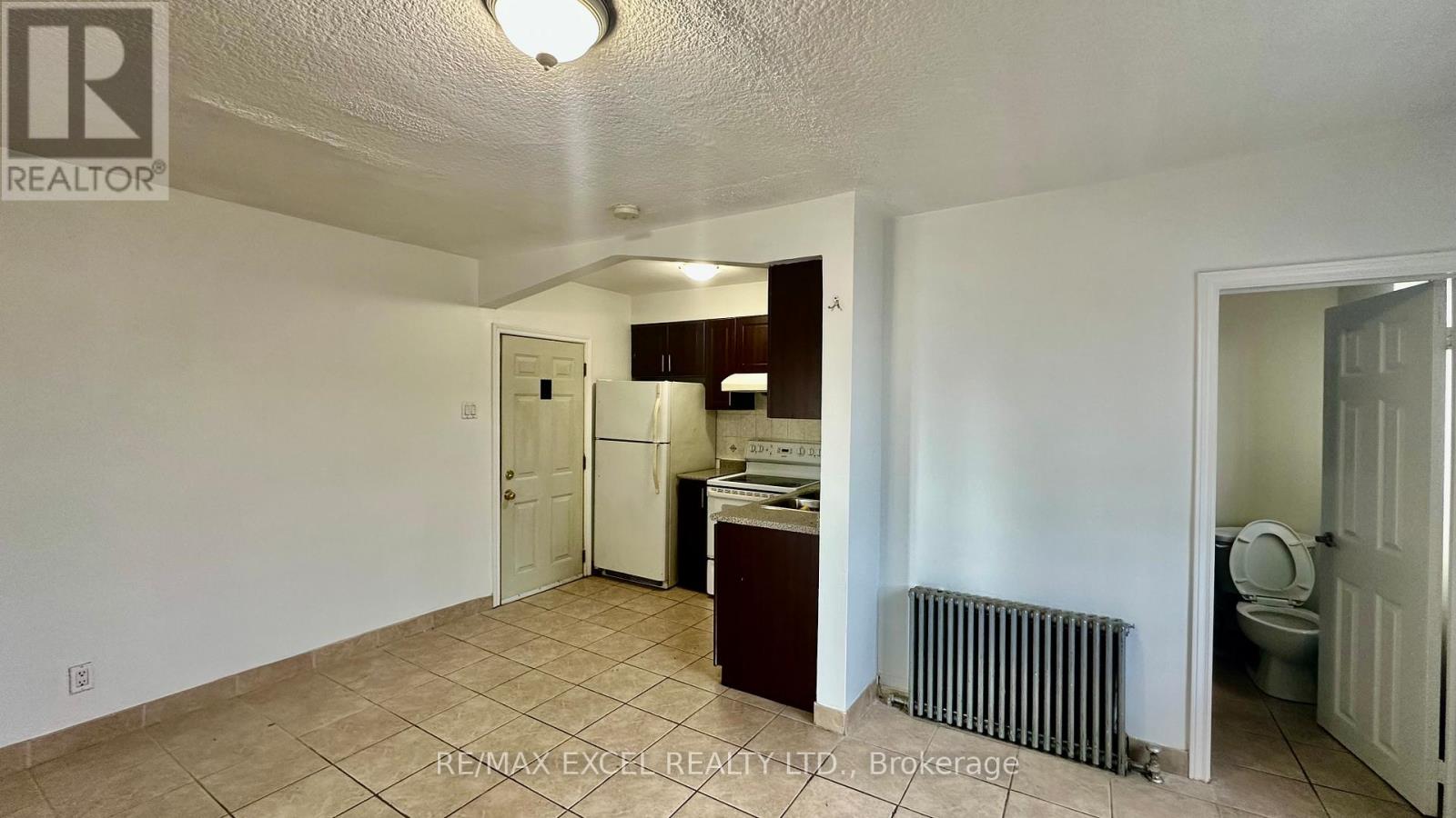 4 - 1023 Coxwell Avenue, Toronto, Ontario  M4C 3G4 - Photo 3 - E13525438