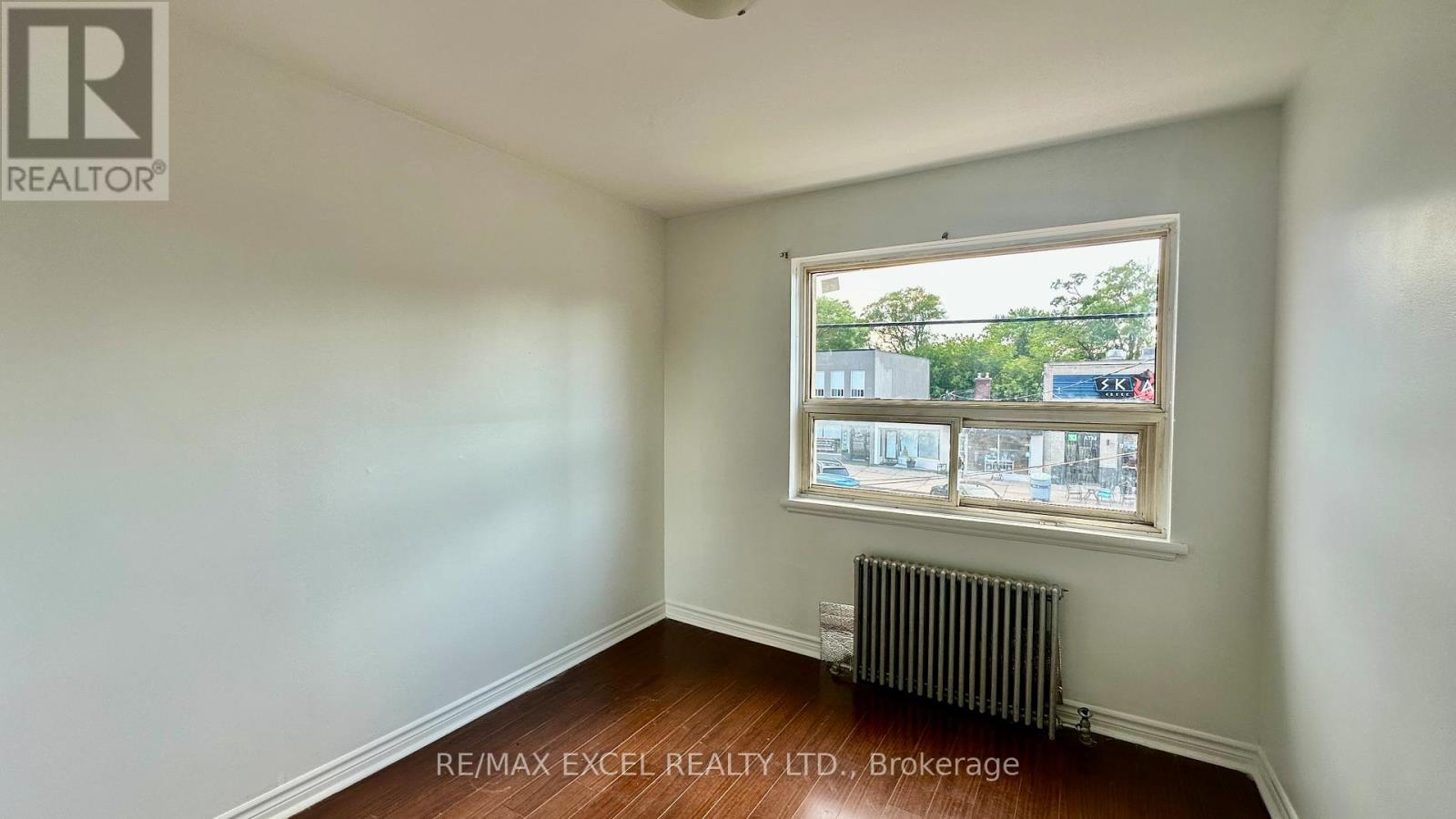 4 - 1023 Coxwell Avenue, Toronto, Ontario  M4C 3G4 - Photo 5 - E13525438