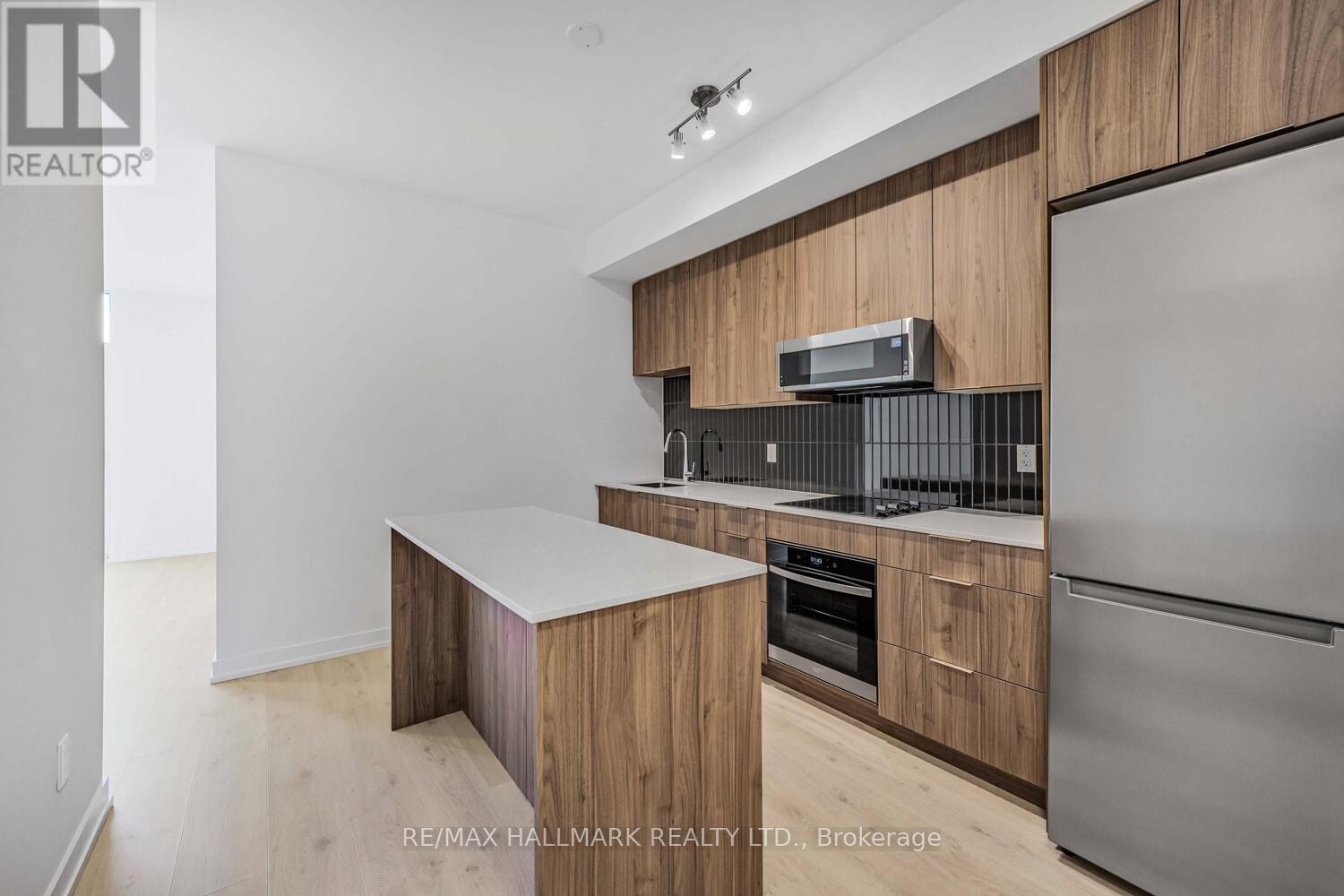 607 - 2501 Saw Whet Boulevard, Oakville, Ontario  L6M 5N2 - Photo 3 - W13525518