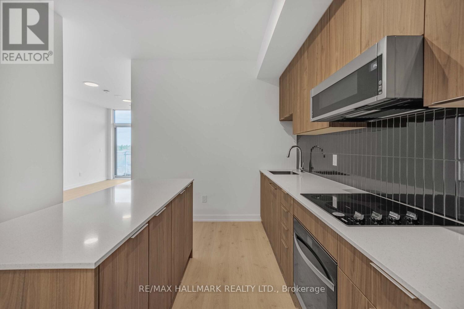 607 - 2501 Saw Whet Boulevard, Oakville, Ontario  L6M 5N2 - Photo 4 - W13525518