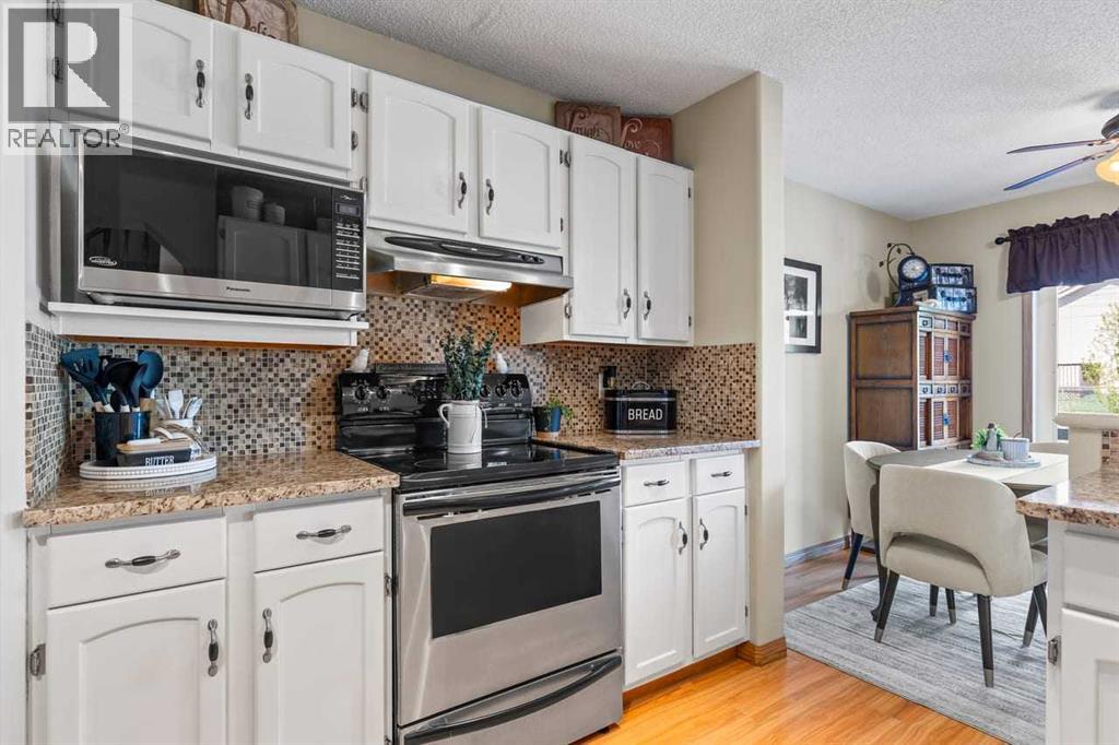 158 Saratoga Close NE, Calgary, Alberta  T1Y 7A1 - Photo 5 - A2325976