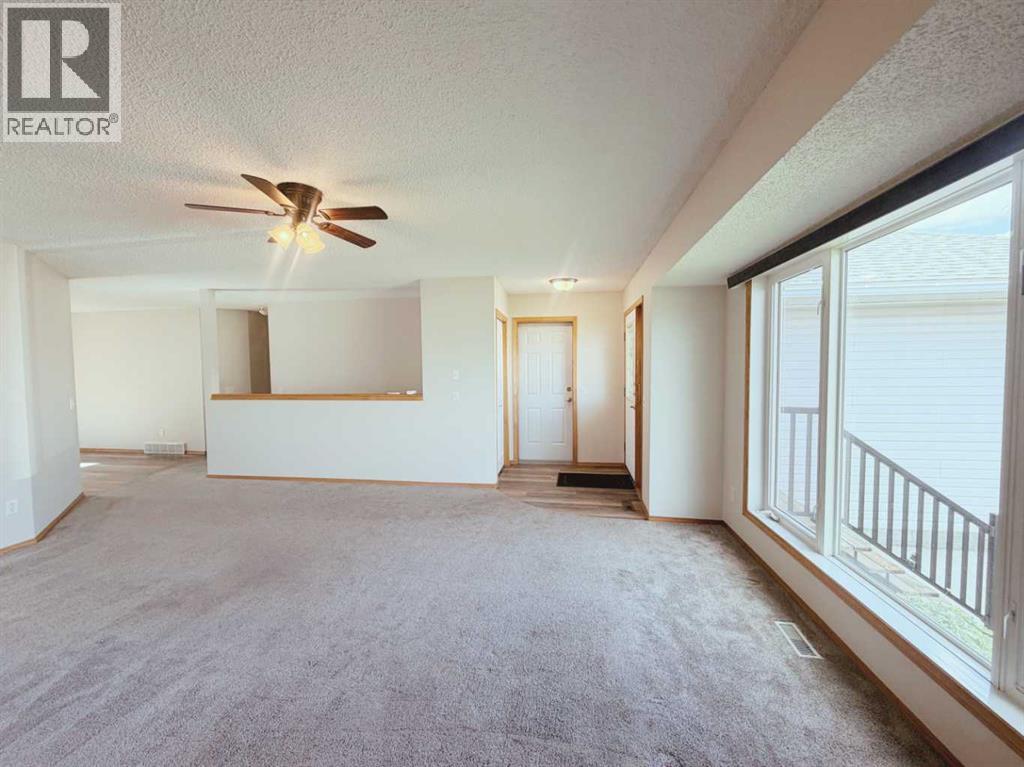 105 Aspen Way, Vulcan, Alberta  T0L 2B0 - Photo 4 - A2279104