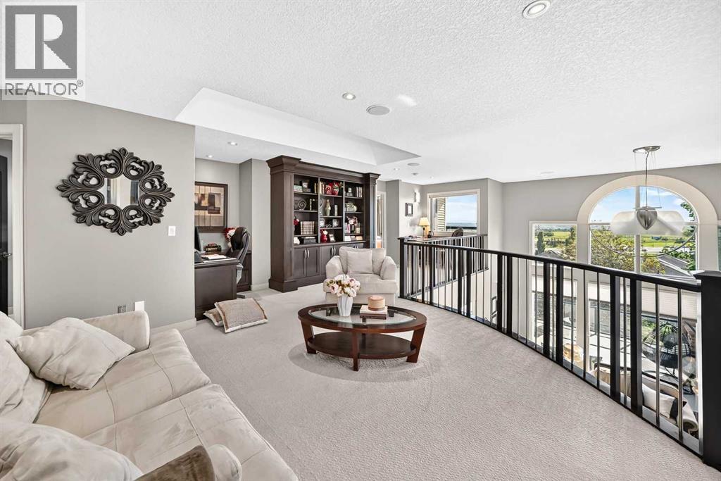 423 Rocky Ridge Drive NW, Calgary, Alberta  T3G 5C2 - Photo 30 - A2323190