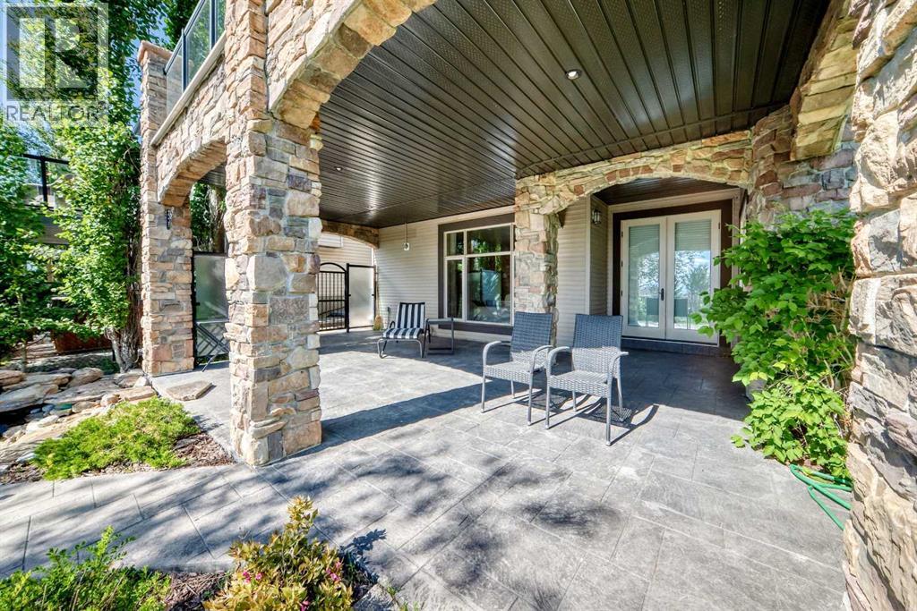 423 Rocky Ridge Drive NW, Calgary, Alberta  T3G 5C2 - Photo 36 - A2323190