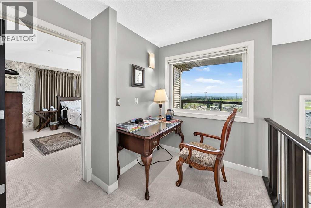 423 Rocky Ridge Drive NW, Calgary, Alberta  T3G 5C2 - Photo 31 - A2323190