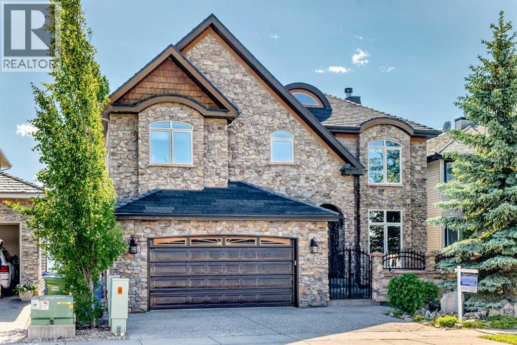 423 Rocky Ridge Drive NW, Calgary, Alberta  T3G 5C2 - Photo 2 - A2323190
