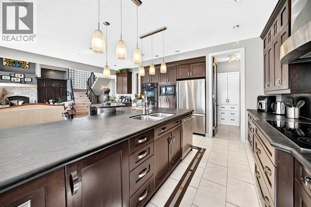 423 Rocky Ridge Drive NW, Calgary, Alberta  T3G 5C2 - Photo 7 - A2323190