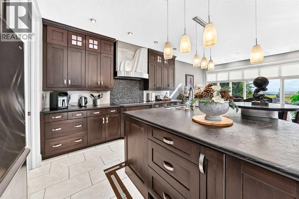 423 Rocky Ridge Drive NW, Calgary, Alberta  T3G 5C2 - Photo 9 - A2323190