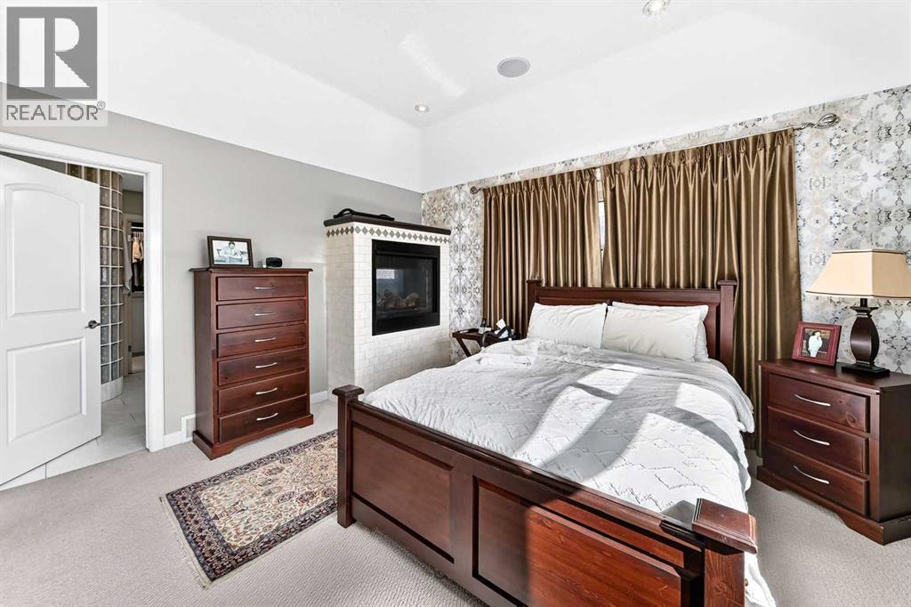 423 Rocky Ridge Drive NW, Calgary, Alberta  T3G 5C2 - Photo 24 - A2323190