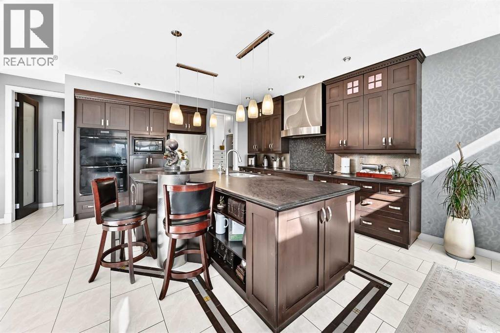 423 Rocky Ridge Drive NW, Calgary, Alberta  T3G 5C2 - Photo 6 - A2323190
