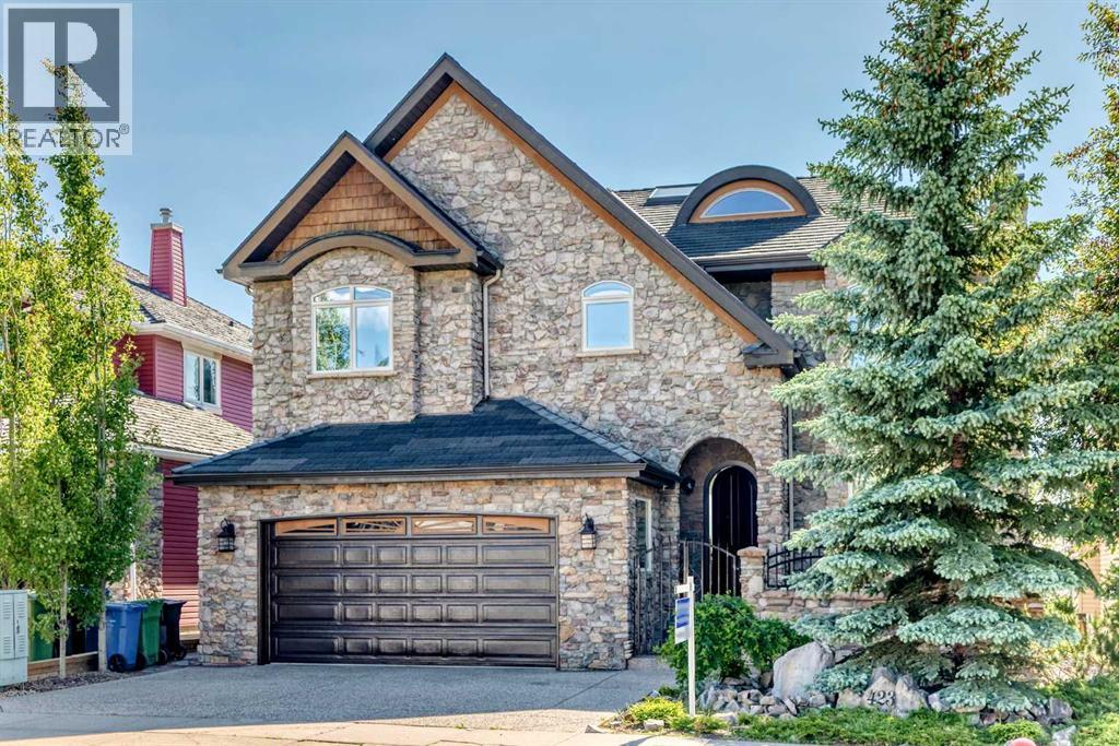423 Rocky Ridge Drive NW, Calgary, Alberta  T3G 5C2 - Photo 3 - A2323190