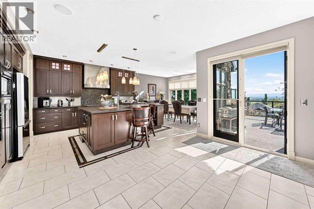 423 Rocky Ridge Drive NW, Calgary, Alberta  T3G 5C2 - Photo 11 - A2323190
