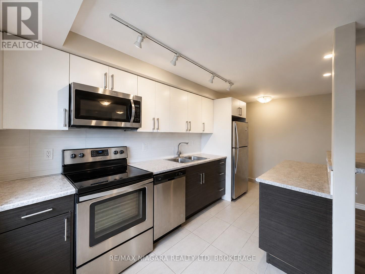 409 - 99 Church Street, St. Catharines, Ontario  L2R 3E1 - Photo 4 - X13528052