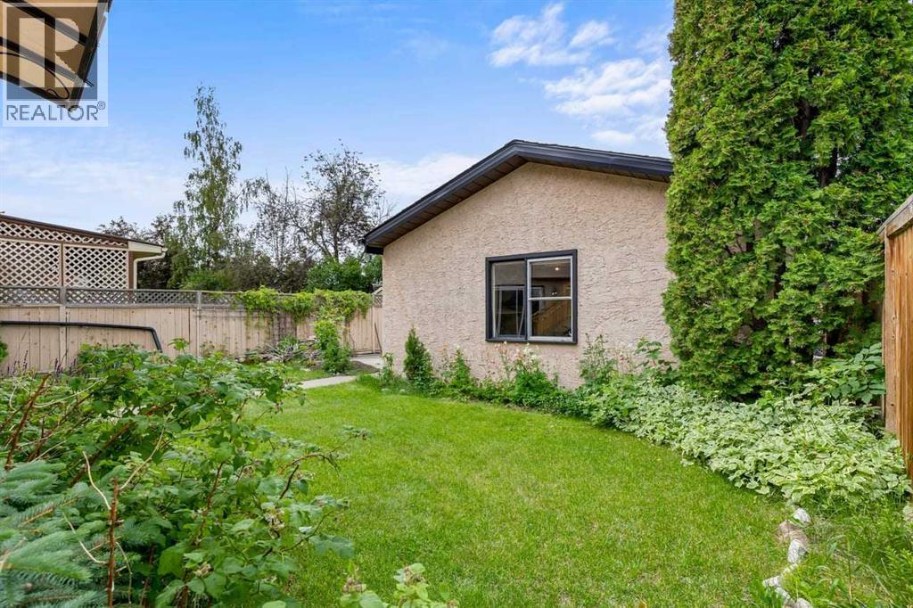 266 Shawnessy Drive SW, Calgary, Alberta  T2Y 1M5 - Photo 3 - A2324670