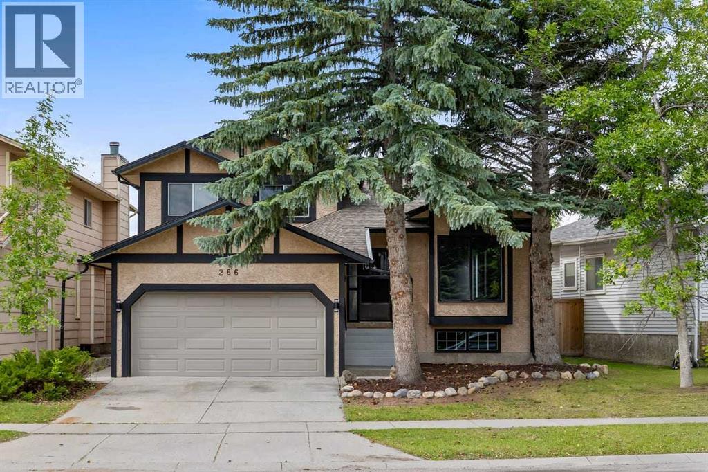 266 Shawnessy Drive SW, Calgary, Alberta  T2Y 1M5 - Photo 1 - A2324670