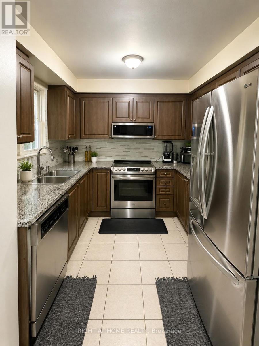 104 Odoardo Di Santo Circle, Toronto, Ontario  M3L 0E8 - Photo 6 - W13529574