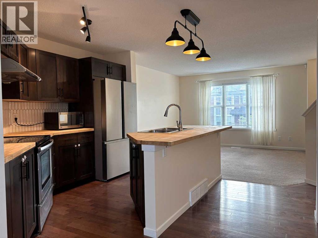 159 Panamount Way NW, Calgary, Alberta  T3K 0P7 - Photo 3 - A2311235