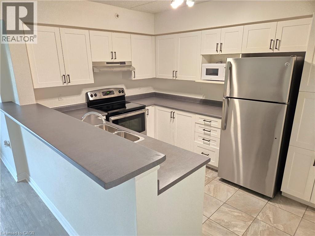 1460 E Main Street E Unit# 210, Milton, Ontario  L9T 8W5 - Photo 4 - 40845652