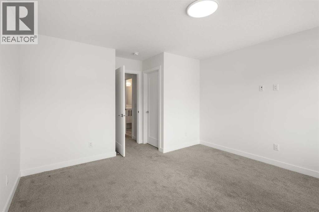 293 Carringsby Way NW, Calgary, Alberta  T3P 1T6 - Photo 22 - A2323022