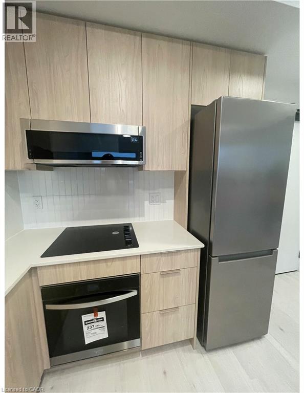 2501 Saw Whet Boulevard Unit# 218, Oakville, Ontario  L6M 5N2 - Photo 10 - 40846187