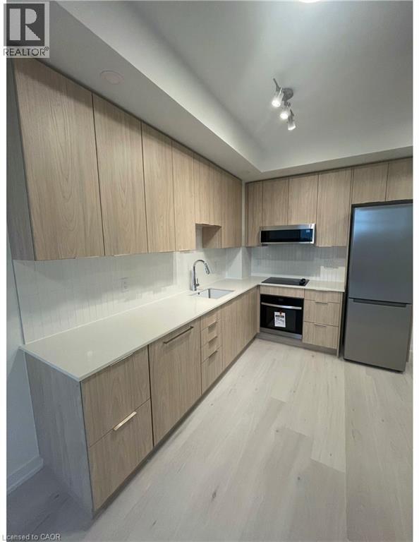 2501 Saw Whet Boulevard Unit# 218, Oakville, Ontario  L6M 5N2 - Photo 9 - 40846187