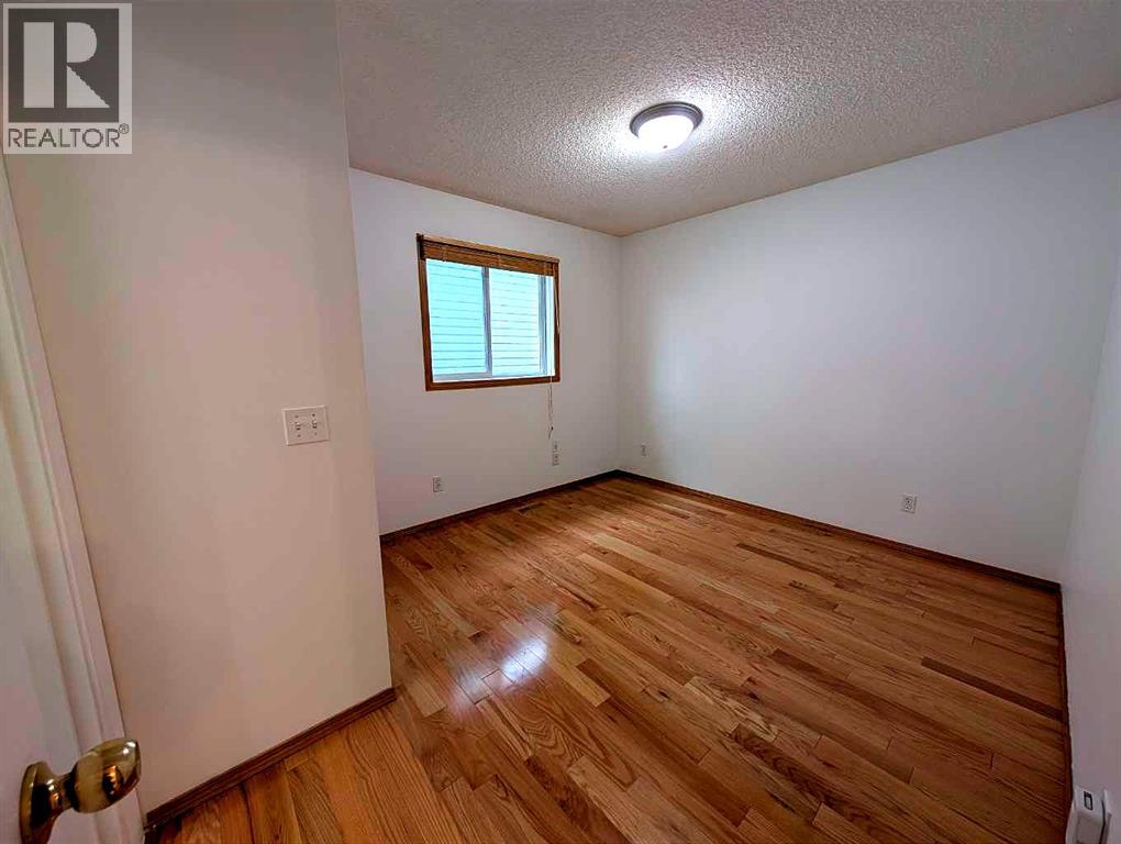 151 Taracove Estate Drive NE, Calgary, Alberta  T3J 4R1 - Photo 11 - A2325112