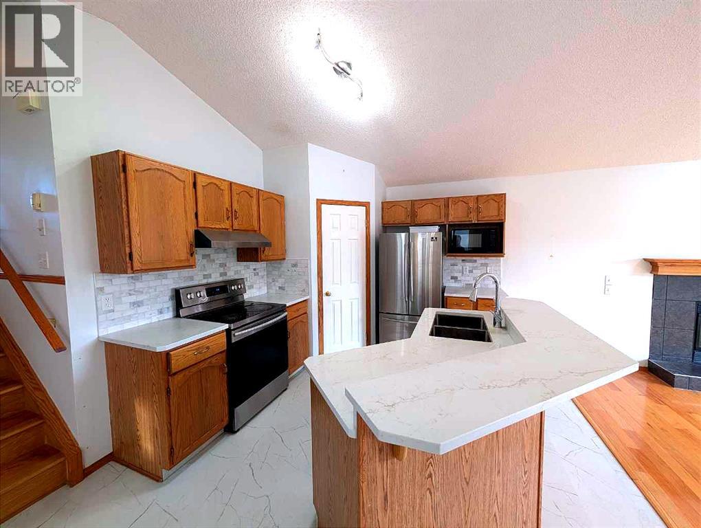 151 Taracove Estate Drive NE, Calgary, Alberta  T3J 4R1 - Photo 6 - A2325112